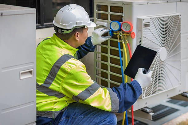 Professional Heat Pump Repair technician working in Troy, AL